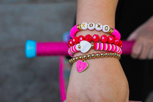 DISC BRACELETS WITH WHITE HEART!